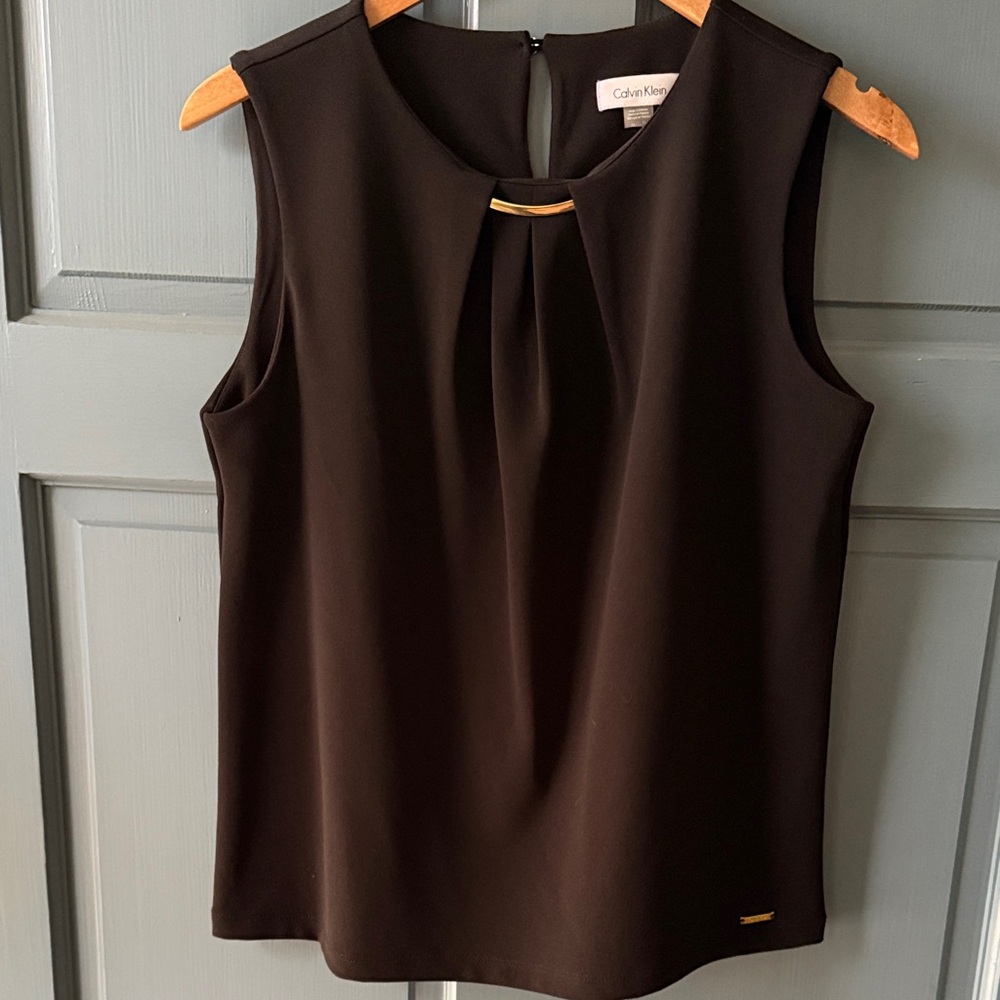 NWOT Calvin Klein Women's Elegant Black Sleeveless Blouse with gold detail
